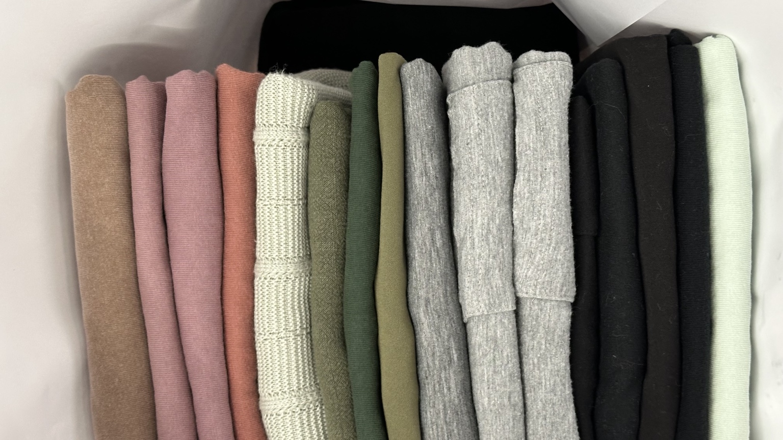 Detail of neatly folded and arranged clothing